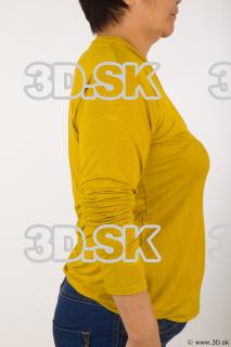 Upper body yellow sweater blue jeans black shoes a pose…